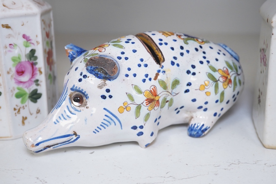 A faience ‘pig’ money bank, and two early 19th century painted lidded jars. Condition - poor, damage to pig.